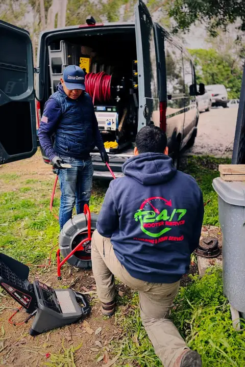 24/7 Rooter Service technician running a sewer camera inspection in Los Angeles